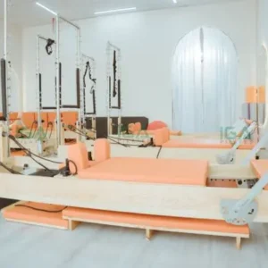 Pilates Reformer vân gỗ tần bì cách điệu