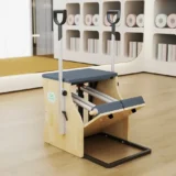 Pilates Wunda Chair khung kim loại với tay cầm chắc chắn